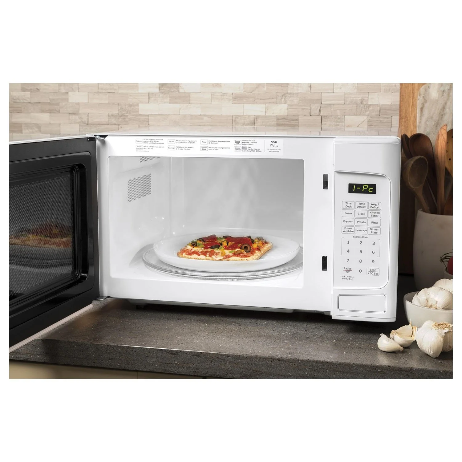 GE 1.1 Cu. Ft. Capacity Countertop Microwave Oven - Image 4