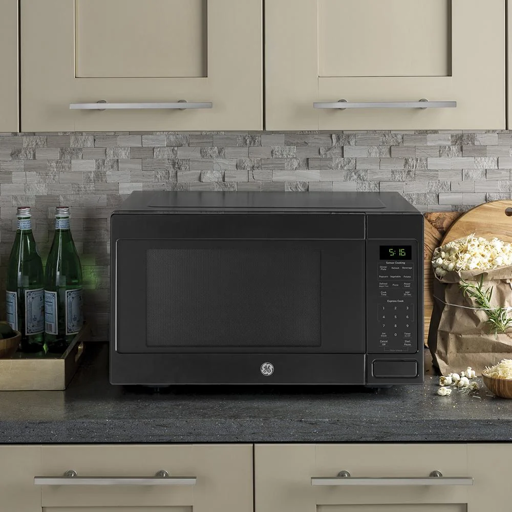 GE 1.6 Cu. Ft. 1,150-watt Countertop Microwave Oven + 2 Year Protection Pack - Image 13
